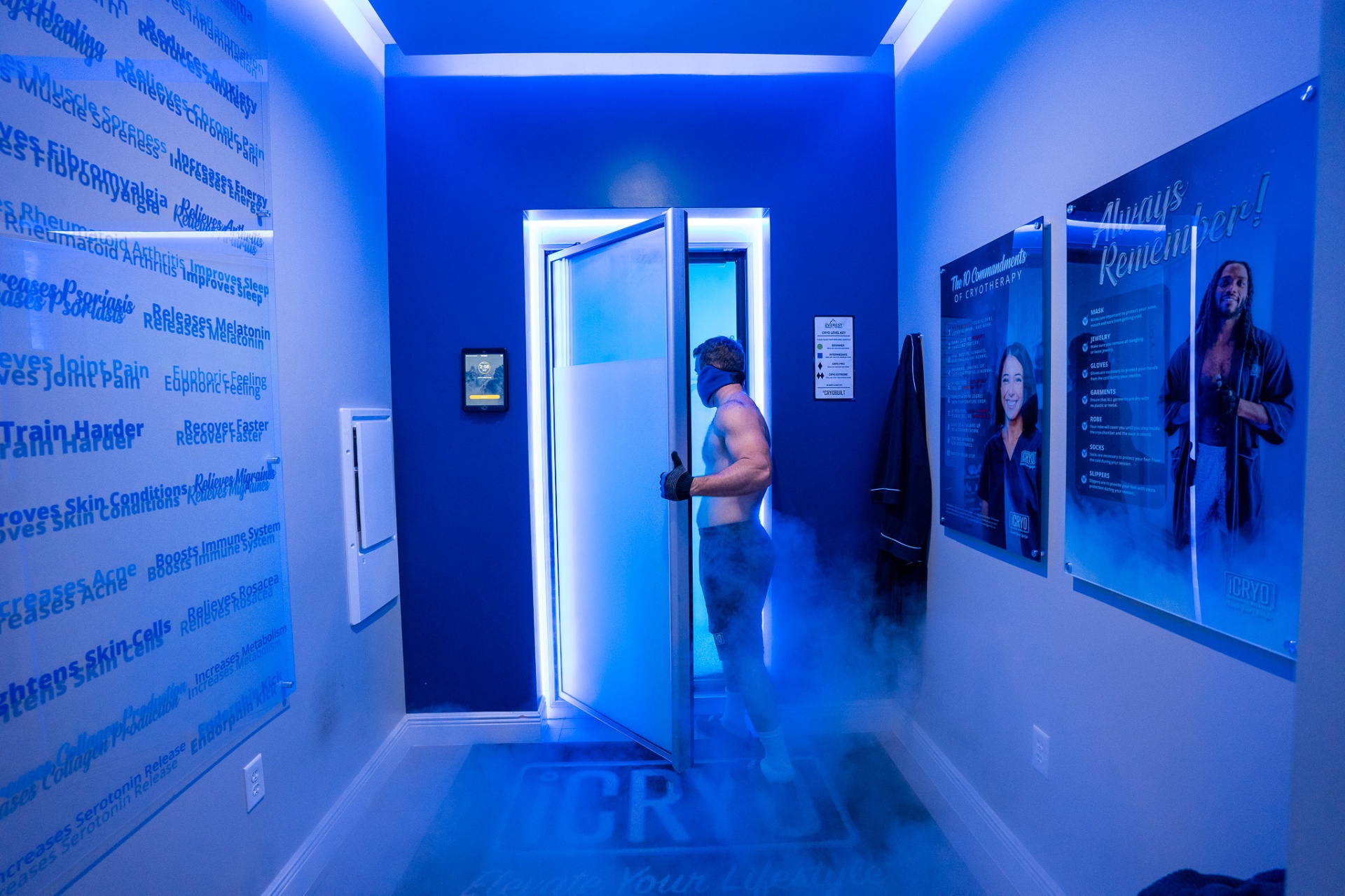 iCRYO Helotes cryotherapy chamber room with benefits wall